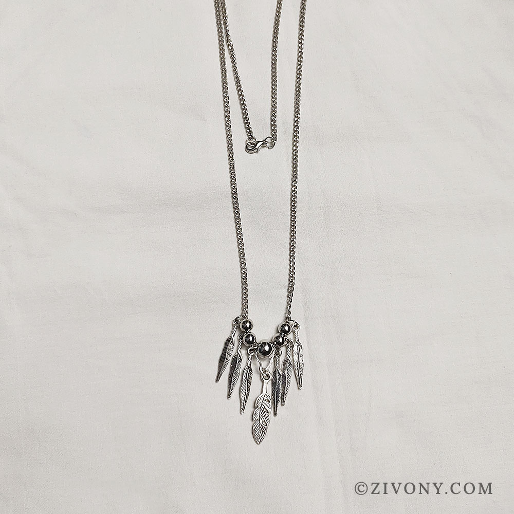 Oxidised feathers boho necklace in white background